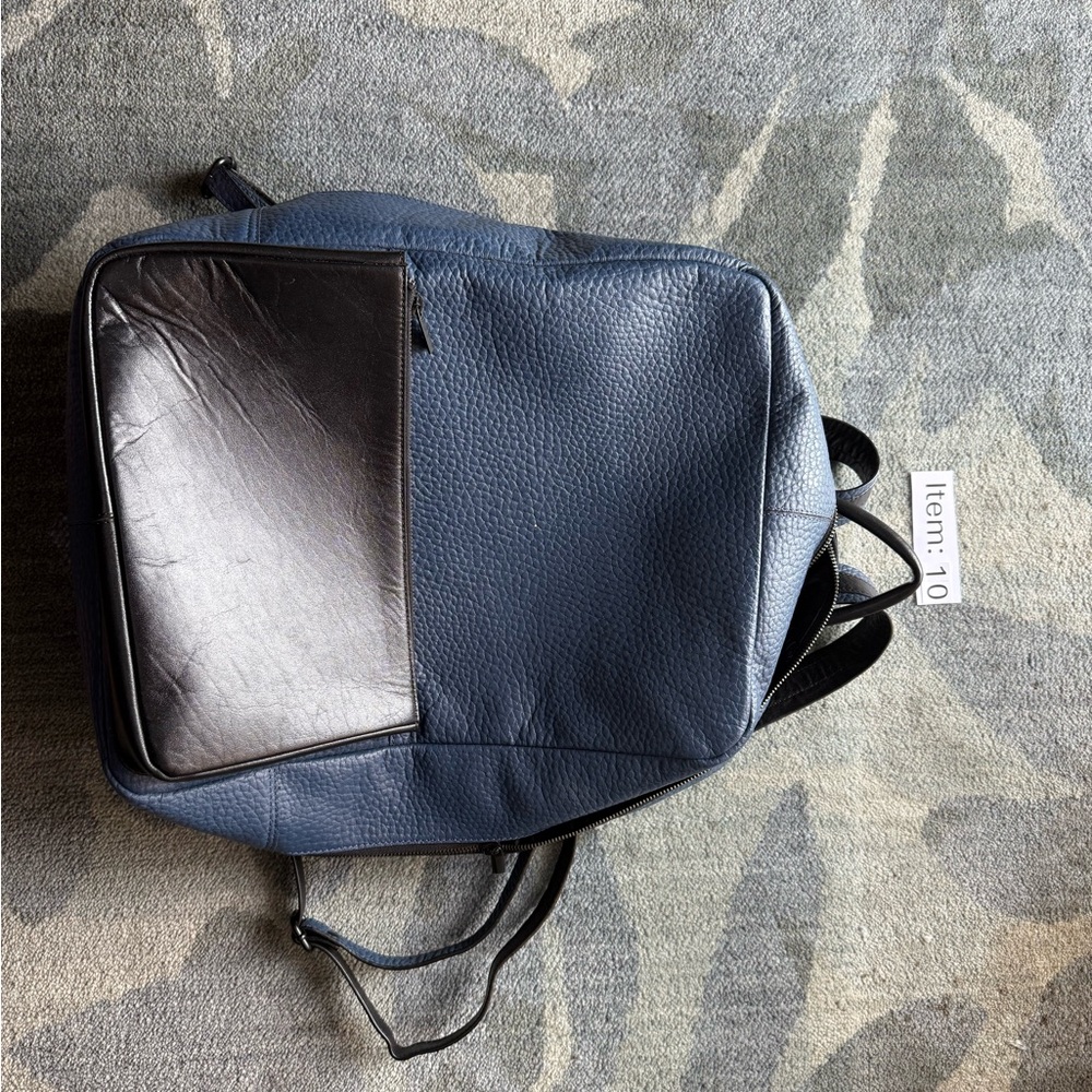 Blue and Black Backpack with Boxy Shape and Smooth Finish